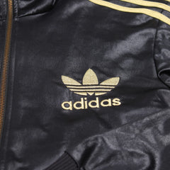 Adidas Trackjacket Chile 62 Schwarz Gold Damen Polyester – Nahaufnahme-1