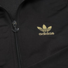 Adidas Trackjacket Firebird Schwarz Gold Damen Polyester – Nahaufnahme-1