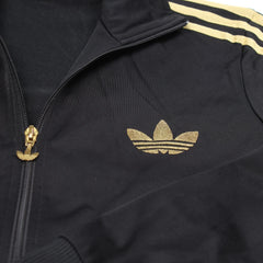 Adidas Trackjacket Firebird Schwarz Gold Damen Polyester – Nahaufnahme-1